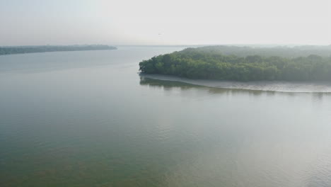 Bagan-Lalang-river-in-foggy-morning,-Sepang,-Selangor,-Malaysia