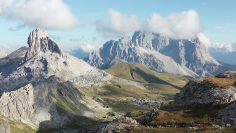 Aerial-mountain-landscape,-wide-establishing-shot,-Dolomites-mountains-Monte-Pelmo-and-Becco-di-Mezzodi