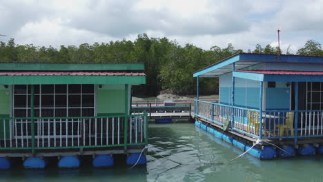 Drone-View-of-floating-house-on-river,-Langkawi,-Malaysia