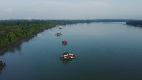 Floating-house-on-Bagan-Lalang-river,-Sepang,-Selangor,-Malaysia