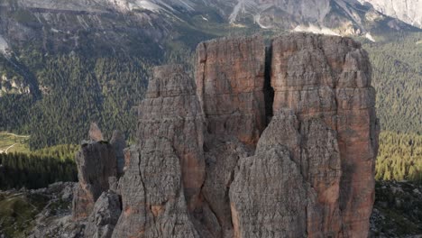 Rocky-mountain-tower-in-Dolomites,-Cinque-Torri-rock-formation-aerial-push-in-close-up-view