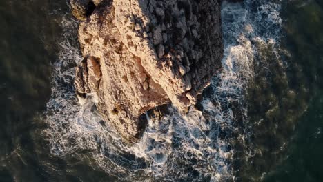Drone-shot-of-Waves-Crashing-Over-Rocks