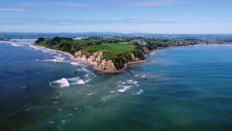 Beautiful-Headland-And-Ocean-At-Maketu-Beach-In-North-Island,-New-Zealand---aerial-drone-shot