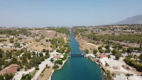 High-angle-Aerial-Drone-shot-of-Corinth-Canal,-Pan-turn