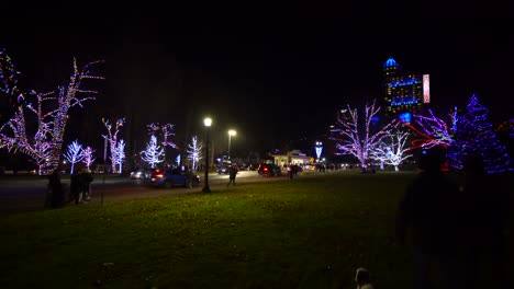 Niagara-Falls-winter-festival-of-lights,-Ontario-Christmas-wide,-casino-in-back