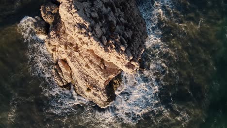 Drone-head-shot-of-Waves-Crashing-Rocks