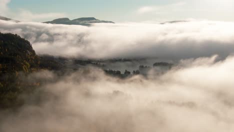 Frosty-autumn-morning-flying-above-the-clouds-in-the-Norwegian-Telemark-area-close-to-the-town-of-Vrådal