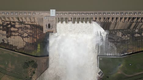 Bird's-eye-view-of-power-dam-releasing-water-during-spring-flooding