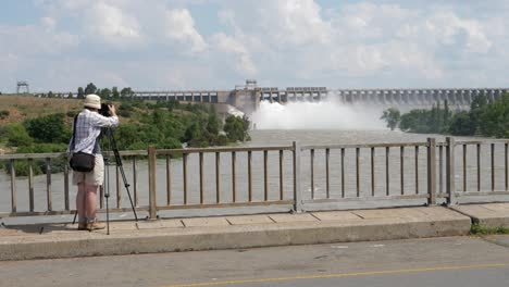 Photographer-on-bridge-shoots-Vaal-River-Dam-releasing-flood-water
