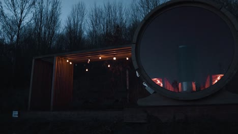 Panoramic-barrel-sauna-day-to-night-transition