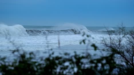 Storm-waves-roll-in-towards-the-coast-in-Noja,-Santander,-Spain