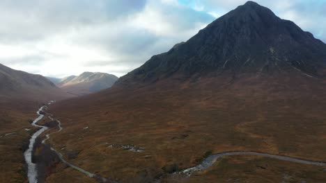 Aerial-footage-moving-very-slowly-towards-Glen-Etive-valley-with-Buachaille-Etive-Mor-in-the-foreground