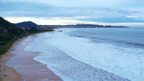White-waves-and-the-coast-at-Noja,-Santander,-Spain