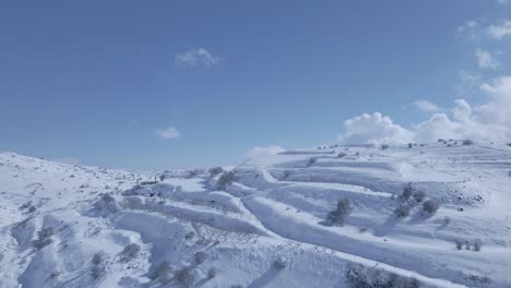 revealing-shot-of-the-ski-slopes-on-Mount-Hermon-and-showing-Ramat-Hagolan