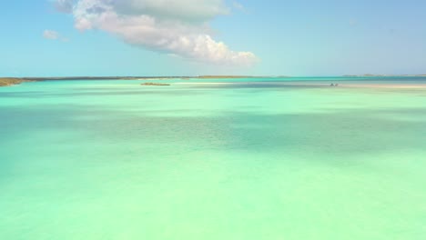 Drone-over-sand-bar-and-ocean-in-Exuma,-Bahamas-4K,-UHD