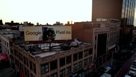 Beautiful-sunset-over-Google-Pixel-Billboard-pan-down-intersection-starbucks