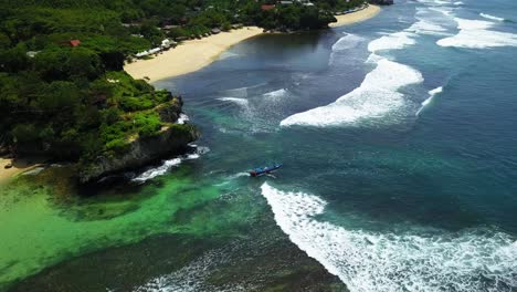 Drone-shot-of-Traditional-fisherman-boat-go-to-the-ocean-from-the-beach---Indonesian-traditional-fishermen