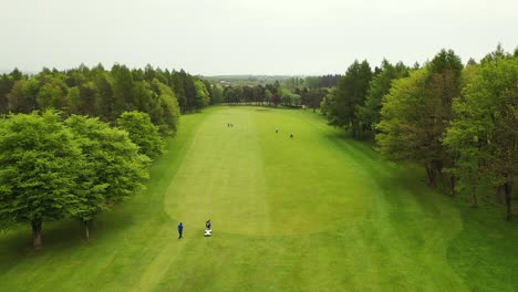 Aerial-Flyover-Shot-of-Golf-Fairway-on-Parkland-Golf-Course-in-Scotland