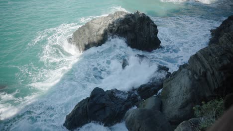 White-waves-splashing-on-the-rocks-of-Italy---Slowmo