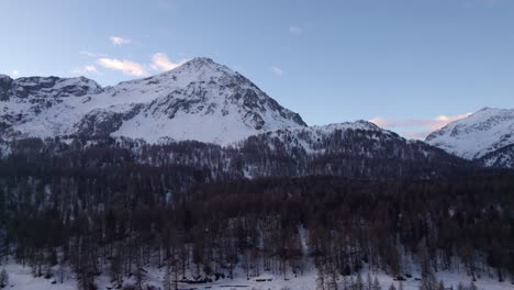 Majestic-Swiss-alp-top-next-to-a-frozen-lake