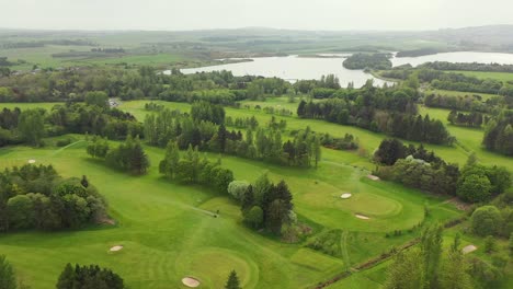 Aerial-Angle-of-Pan-Around-Lochore-Meadows-Golf-Course-in-Fife,-Scotland