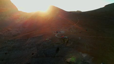 beautiful-drone-shot-going-backwards-as-the-sun-sets-while-on-the-mountain
