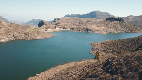 aerial-shot-in-close-up-to-the-water-dam-known-as-Las-Niñas-in-the-municipality-of-Tejeda