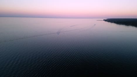 Dusk-Ocean-Pan-with-Boats---Drone
