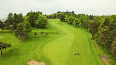 Aerial-Drone-Flyover-Shot-of-Hole-on-Glenrothes-Golf-Course-in-Fife,-Scotland