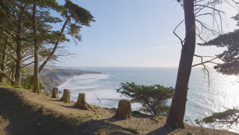 Time-lapse-from-hillside-of-waves-rolling-into-the-shores-of-Big-Sur-beach-located-in-California