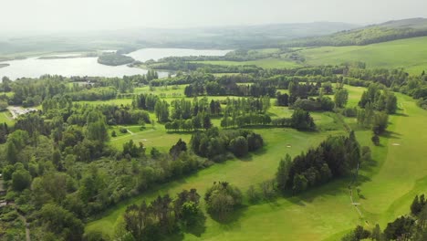 Aerial-Angle-of-Pan-Around-Lochore-Meadows-Golf-Course-in-Fife,-Scotland