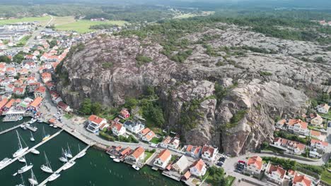 Fjallbacka,-Sweden-Harbor-Cliff-Drone-Flyout