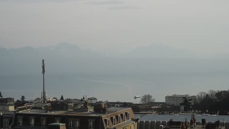 Tourism-boat-on-Lausanne-lake-with-alps-in-background