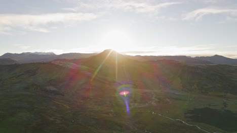 Beautiful-Golden-Hour-Sunset-Sunrise-Sunlight-Setting-Behind-Stunning-Iceland-Mountain-Peak