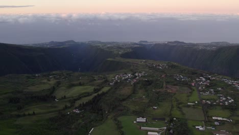Fly-over-mountains-and-rifts-during-sunset-in-Reunion-Island