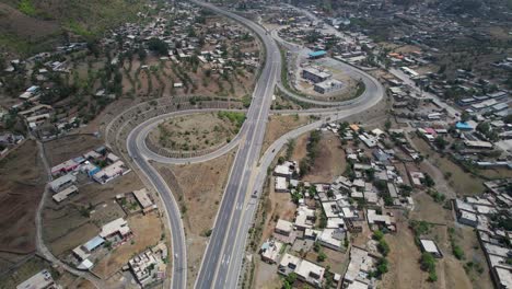 aerial-view-of-hazar-motorway-at-lora-chowk-junction,-havelian,-KPK-Pakistan