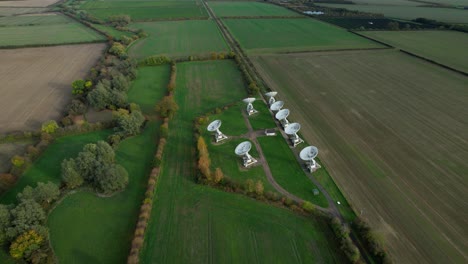 Mullard-MRAO-radio-observatory-telescope-array-on-Cambridge-farmland-aerial-orbiting-view