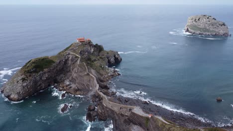 famous-gaztelugatxe-in-the-basque-country-in-northern-spain-at-the-atlantic-ocean,-drone-shot