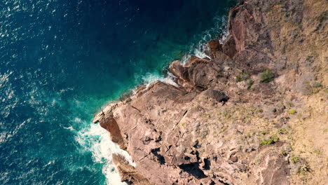 Aerial-shot-of-ocean-coast-with-views-of-waves-and-cliffs