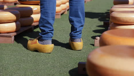 Man's-Feet-In-Dutch-Clogs-At-The-Cheese-Market-In-Gouda,-Netherlands