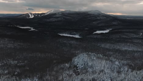 Gloomy-Atmosphere-Of-Forest-And-Mountains-During-Sunset-Of-Winter-In-Orford,-Quebec,-Canada
