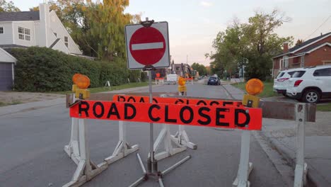 Road-closed-barricade-sign-in-street-residential-approached