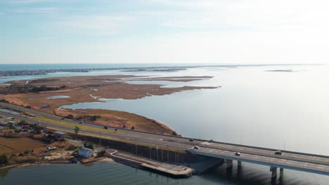 Drone-footage-pan-of-Causeway-Bridge-to-Long-Beach-Island,-New-Jersey