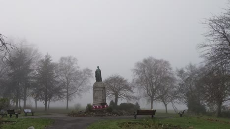 World-War-Cenotaph-in-Park-Surrounded-by-Misty-Fog-and-Spaced-Out-Trees-UK-4K