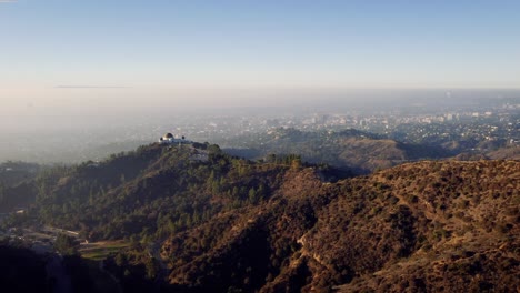 Misty-morning-over-los-Angeles-along-with-Griffith-observatory-with-the-Westside-skyline-of-the-city-in-the-background