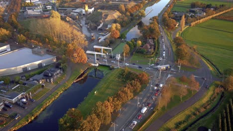 Helmond-city-with-passage-bridge-over-the-small-dam-to-the-street,-Kanaaldijk-Z