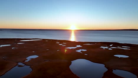 Scenic-Sunset-In-The-Ocean-In-Eyrarbakki,-Iceland---aerial-drone-shot