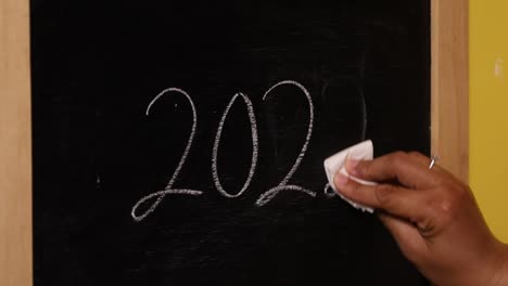 Someone-erased-the-number-2022-on-the-blackboard-then-replaced-it-with-the-number-2023