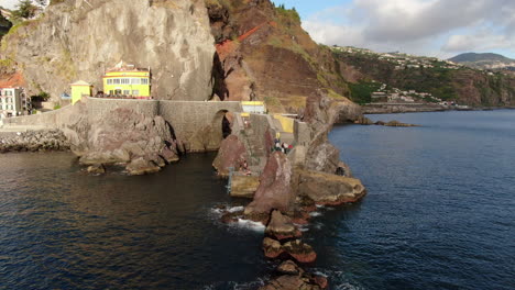 Fantastic-aerial-shot-in-orbit-to-the-bridge-and-the-city-Ponta-do-Sol-on-the-island-of-Madeira-on-a-sunny-day