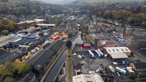 Aerial-view-industrial-town,-village-in-the-heart-of-the-Yorkshire-Pennines-Hills